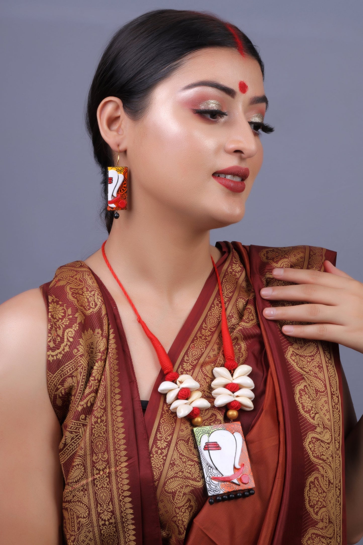 Trinika- Handcrafted clay Ganesha Necklace Set